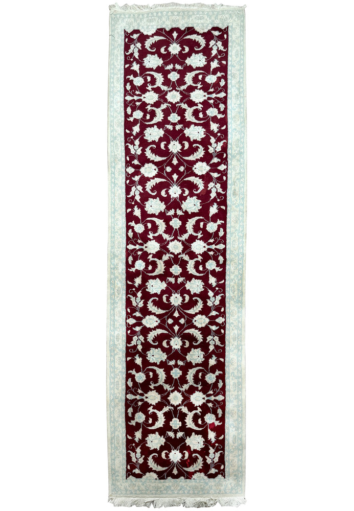 Full view of 2'8 x 9'6 Persian Nain Runner showcasing burgundy field with pale blue floral motifs and a contrasting light blue border.