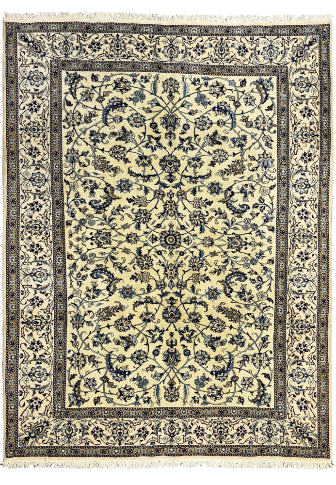 Full view of an 8'2 x 11'6 Persian Nain rug showcasing intricate blue floral patterns on a cream background. Full view of an 8'2 x 11'6 Persian Nain rug showcasing intricate blue floral patterns on a cream background.