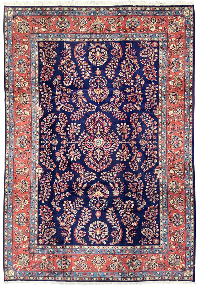 Full view of 8 x 11'8 Persian Sarough handmade rug with navy blue field and floral motifs. Full view of 8 x 11'8 Persian Sarough handmade rug with navy blue field and floral motifs.