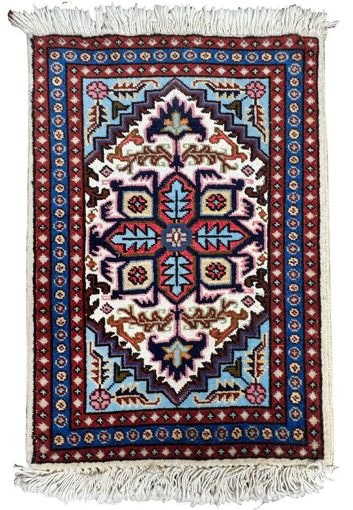 Full view of 1'3 x 2' Persian Ardebil Wool & Silk Poshti rug with central medallion and geometric borders. Full view of 1'3 x 2' Persian Ardebil Wool & Silk Poshti rug with central medallion and geometric borders.