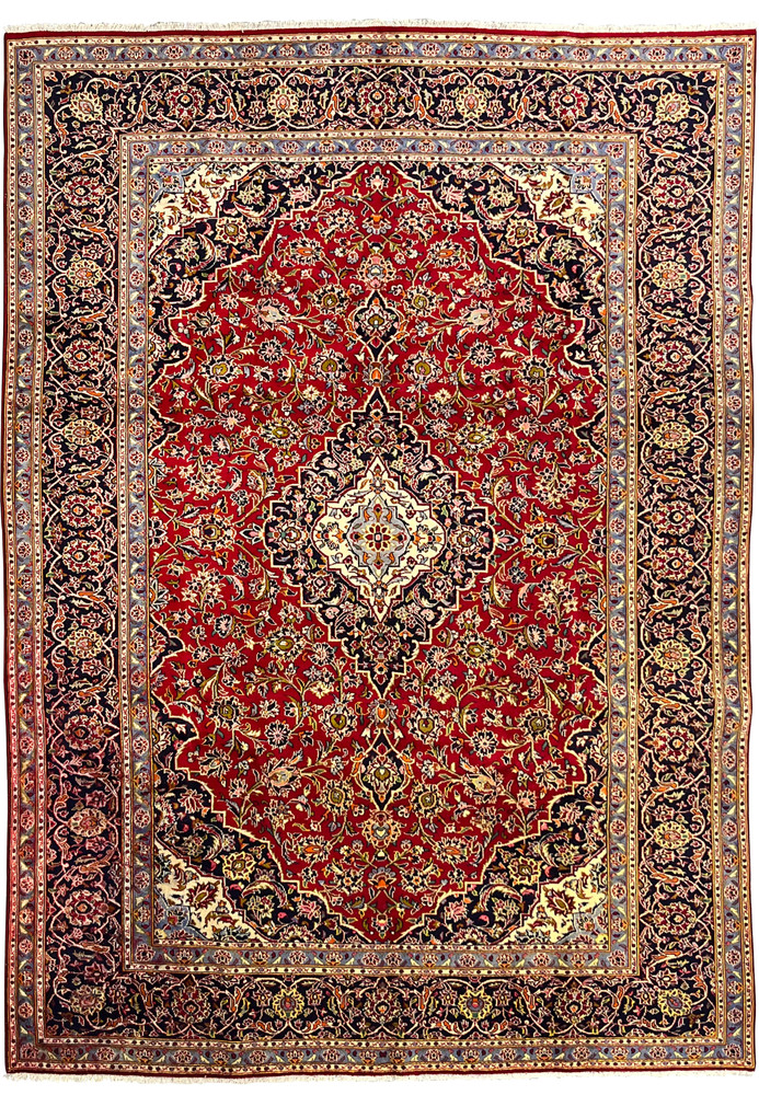 9x13 Persian Kashan rug full view showing discoloration on border