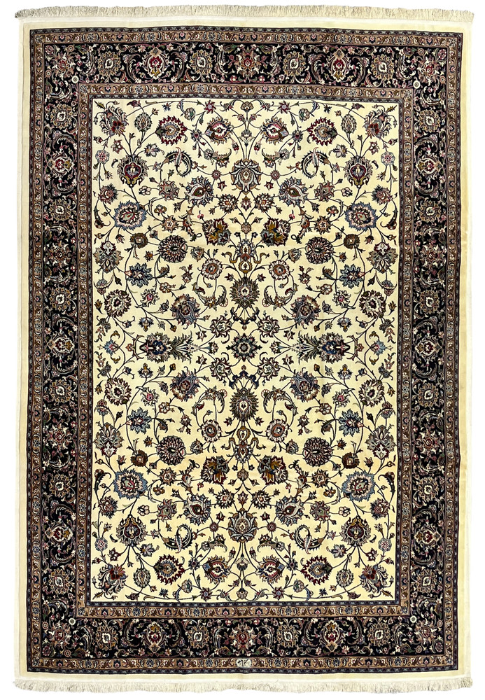 8x12 Signed Persian Mashad Saber rug with ivory field and dark navy floral border, full view