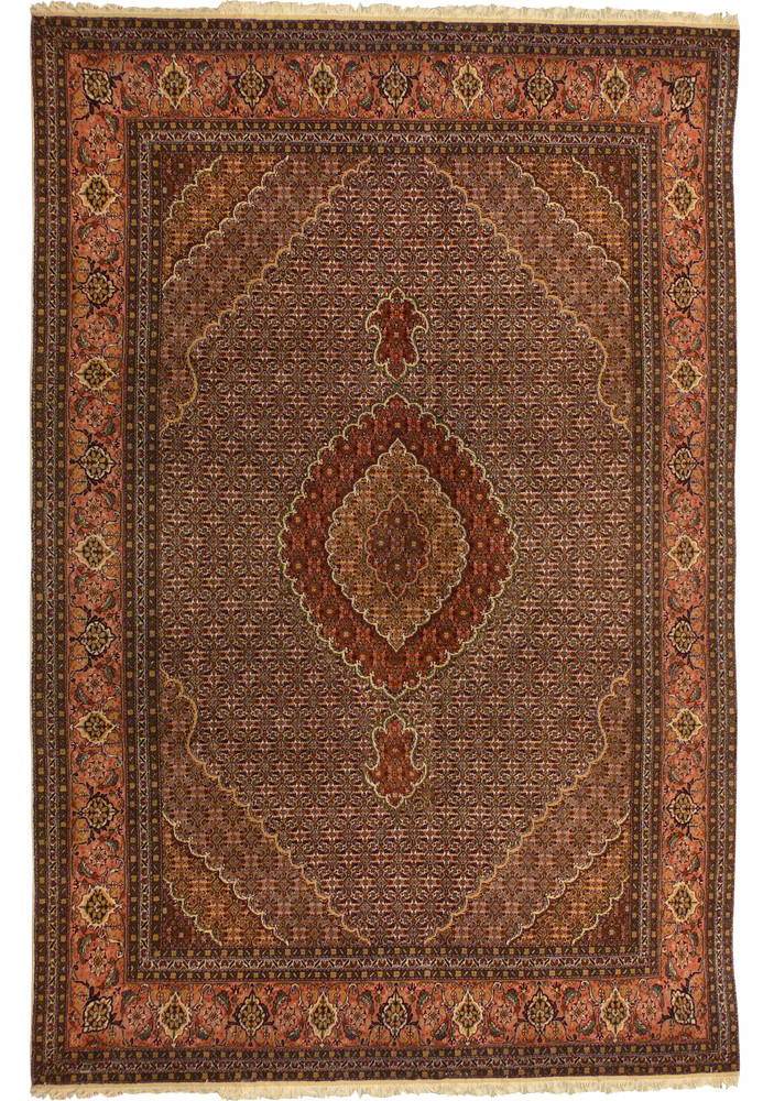 Full view of 6'6 x 10 Persian Tabriz Mahi rug with allover Herati design and earth tone palette