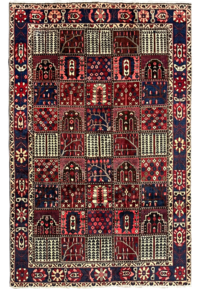 Hand-knotted 7x10 Persian Bakhtiari wool rug with red and navy panel design, full view