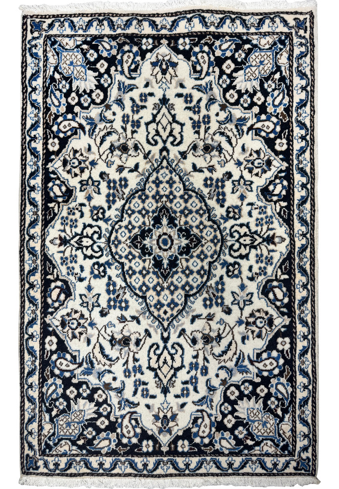 Full overhead view of 3x5 Persian Nain rug, ivory field with navy border and central floral medallion