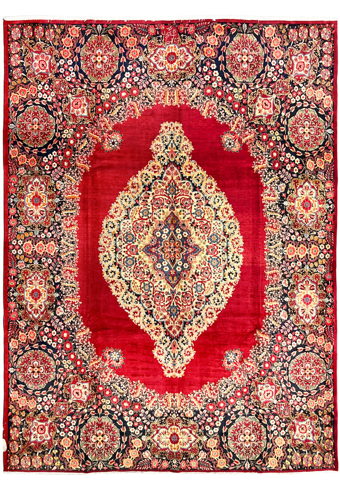 Full view of 10x14 signed antique Persian Moud rug, ivory cartouche medallion with deep navy floral border, pre-revolution