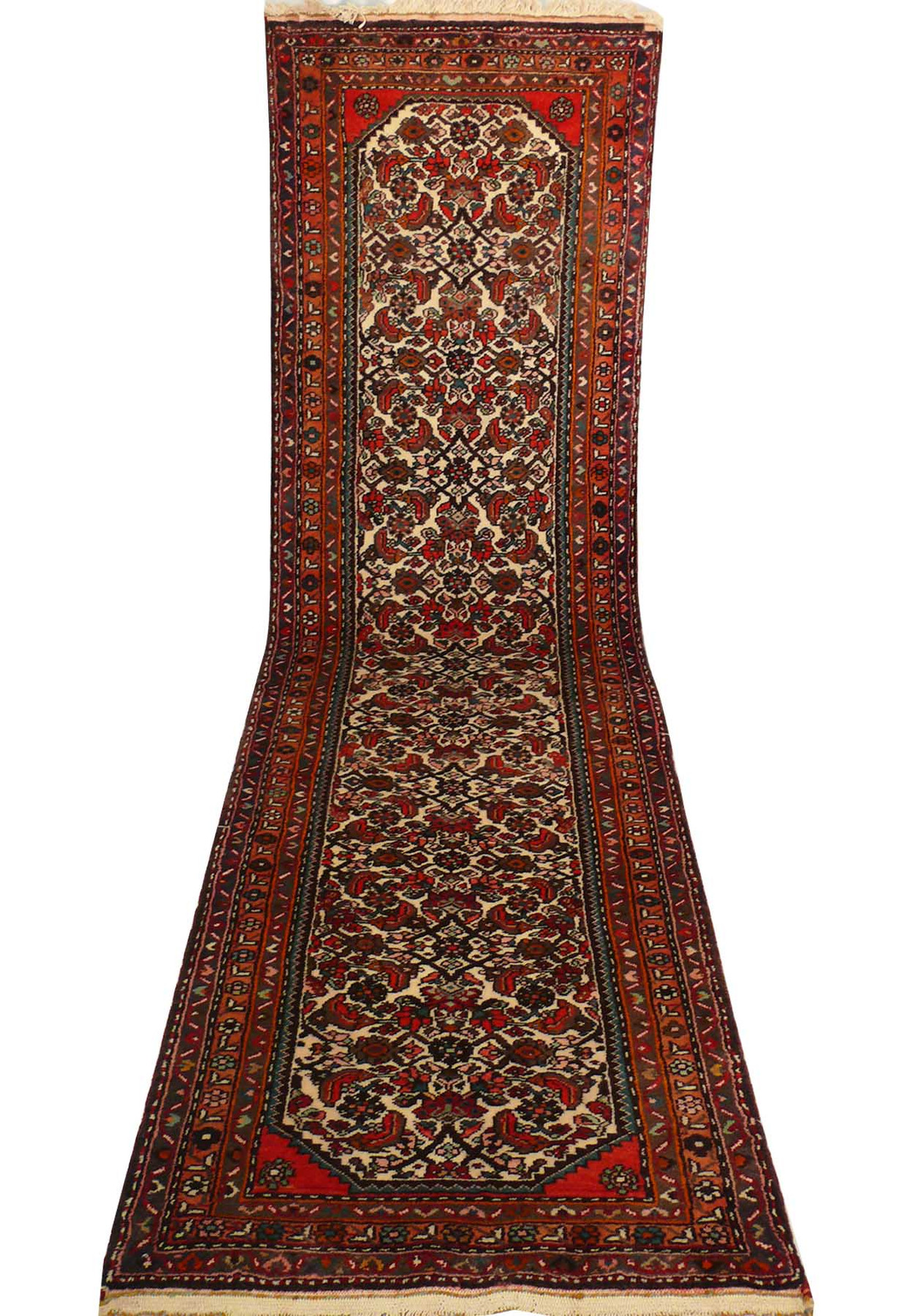 Perspective view of the Persian Rudbar Runner Rug laid out, emphasizing its length and detailed motifs.