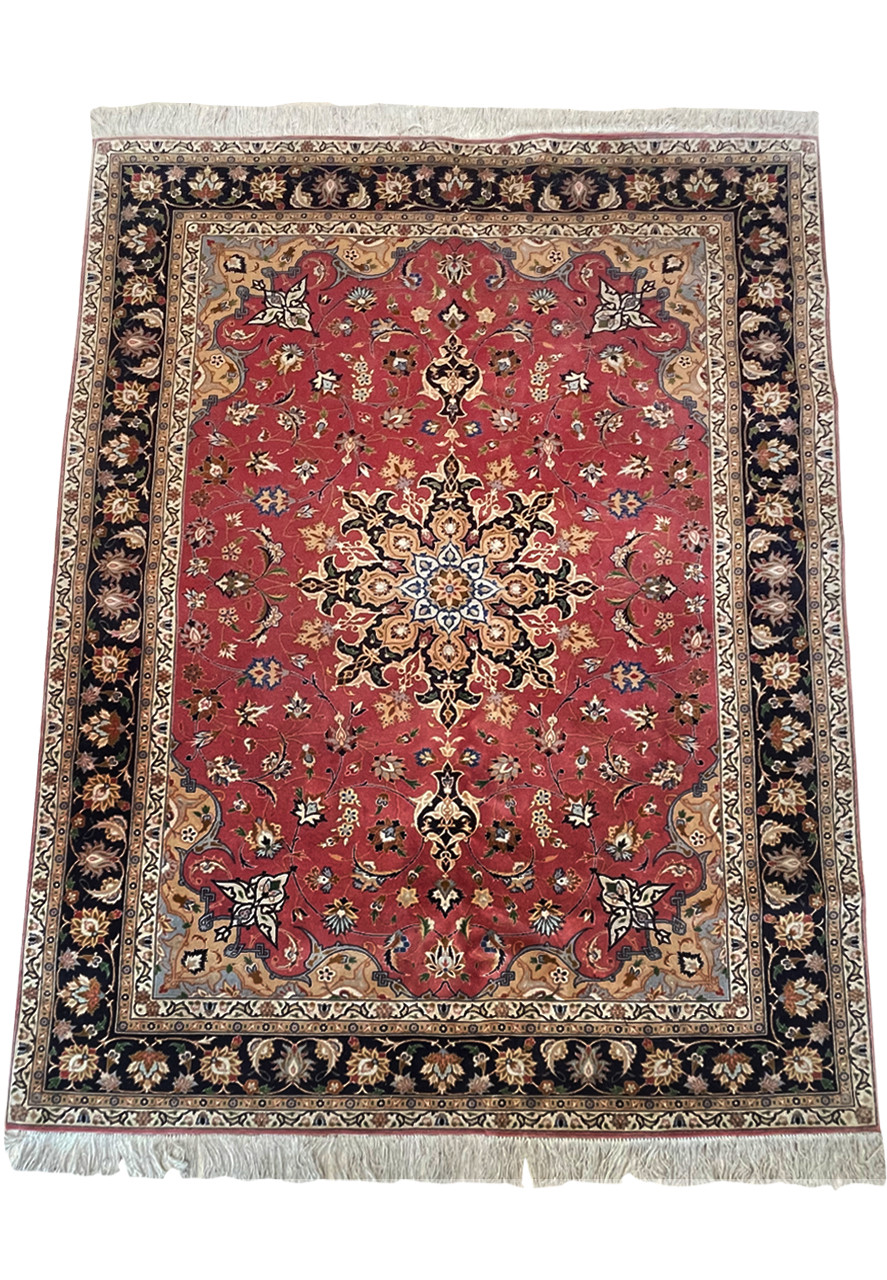 Close-up of Intricate Details and Patterns on a Luxurious Persian Tabriz Rug