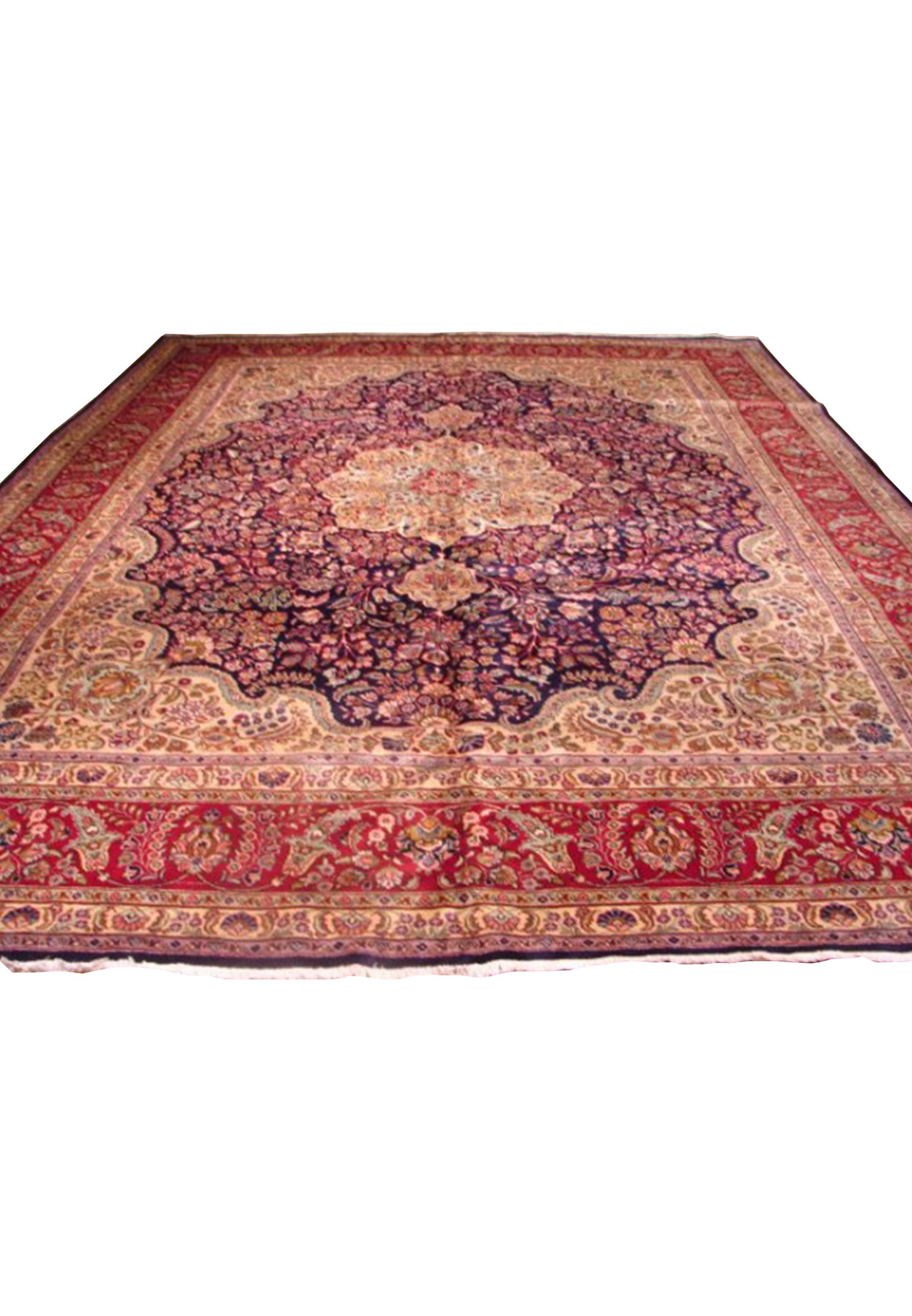 Full view of an 11'3" x 14'5" Persian Mashad rug with a navy field and vibrant floral patterns in red, beige, and pastel hues