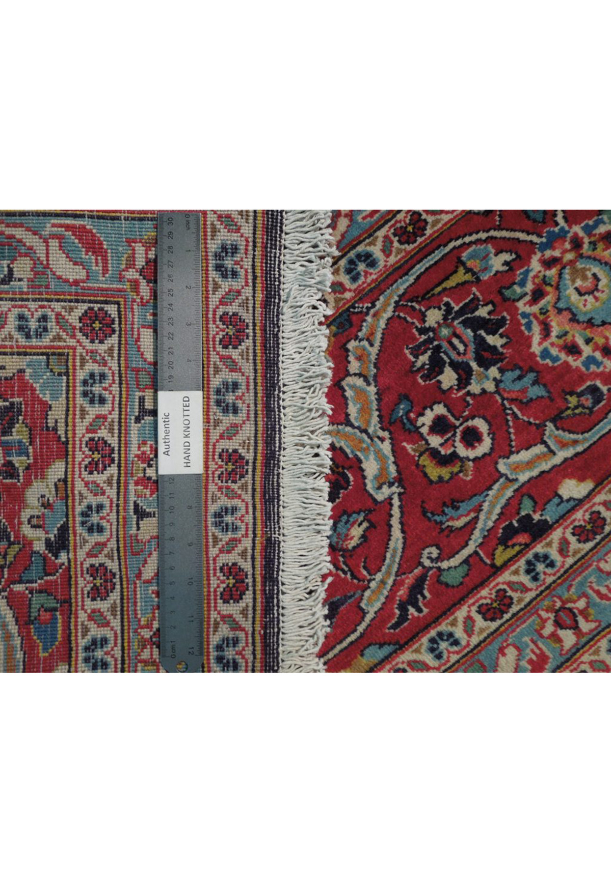 Luxurious 10x13.5 feet Persian Kashan rug, handwoven with a central medallion and intricate floral patterns in a high-quality wool pile
