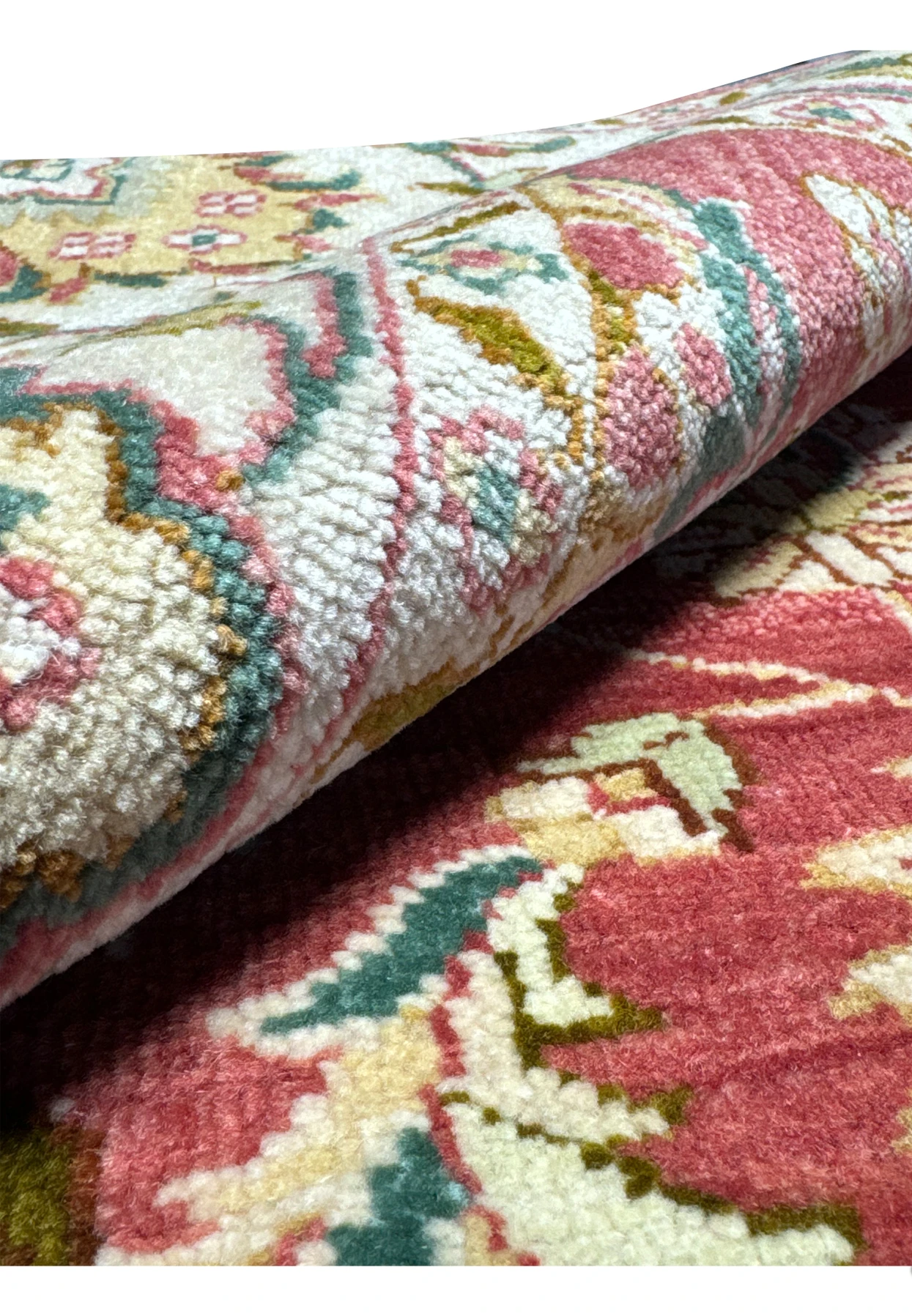 Rolled 6x9 Ziegler Rug showcasing the plush pile and detailed pattern, indicative of the luxurious texture and design found in handmade oriental rugs.