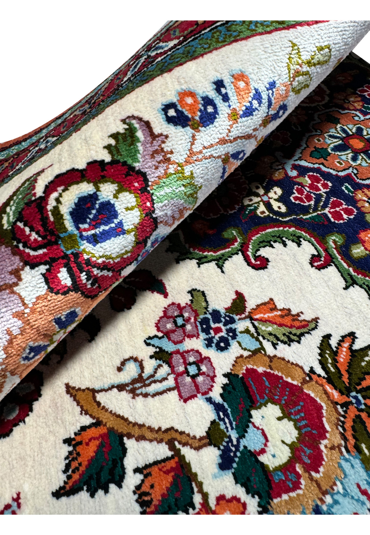 Side view of a Persian Qum silk rug, emphasizing the tight weave and the rug's edge finishing