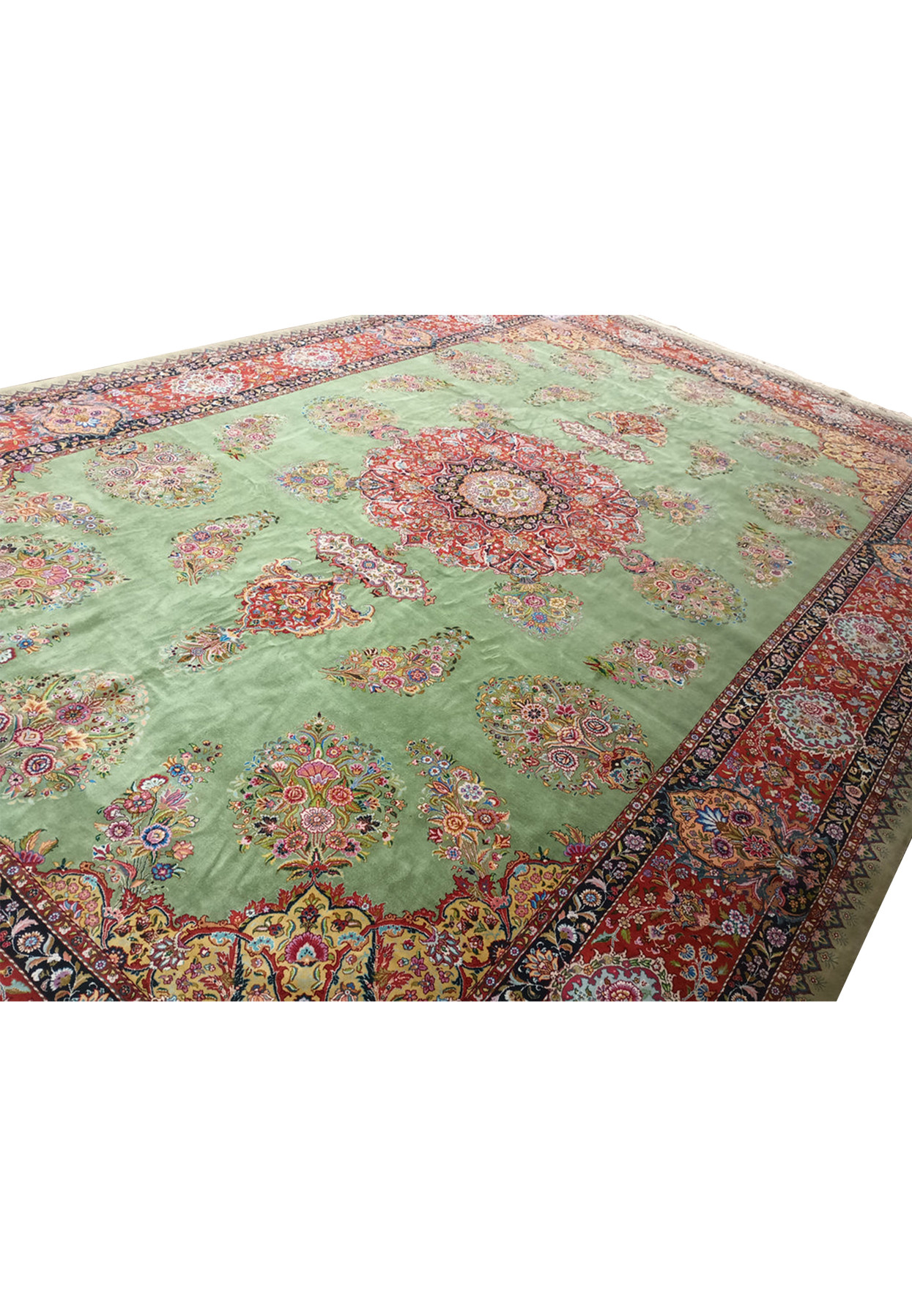 Angled view of a 12x18 Persian rug, illustrating the expansive artistry and scale of the traditional Tabriz design