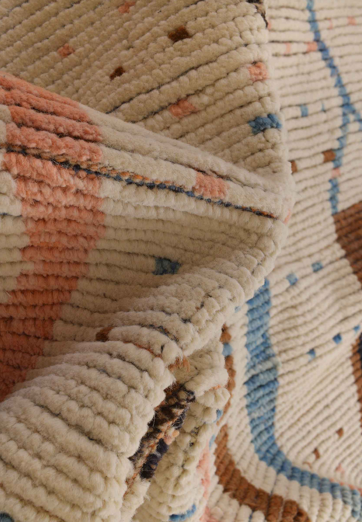 Folded 12x18 Moroccan Modern Rug made in Pakistan showing the fine weave.