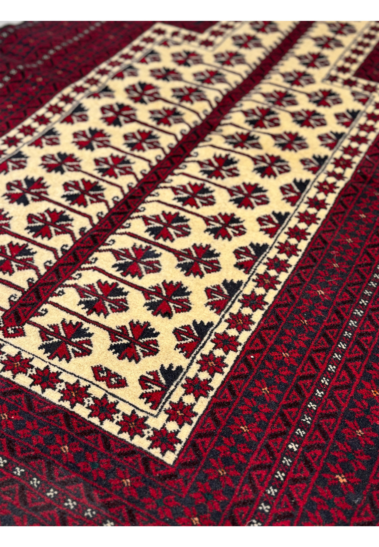 Detailed edge view of the Persian Baluch Prayer Rug showing the fine weave and fringe