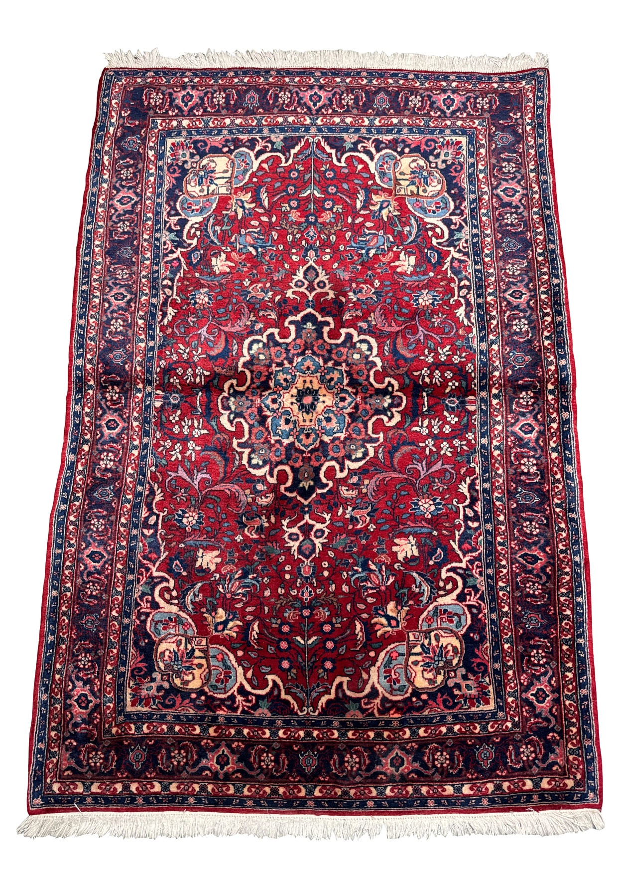 Close-up of the Persian Sarough rug highlighting the intricate details and color variations in the central design area.
