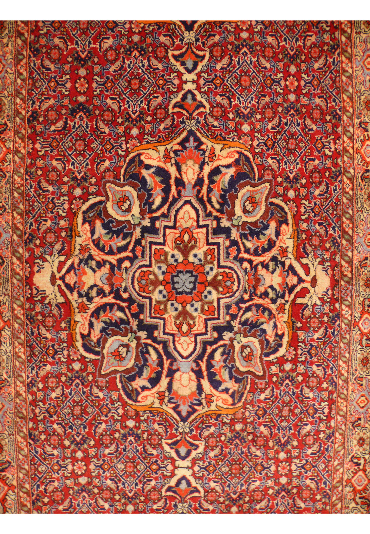 Close-up of the central medallion of the Persian Bijar Runner highlighting the unique and intricate pattern