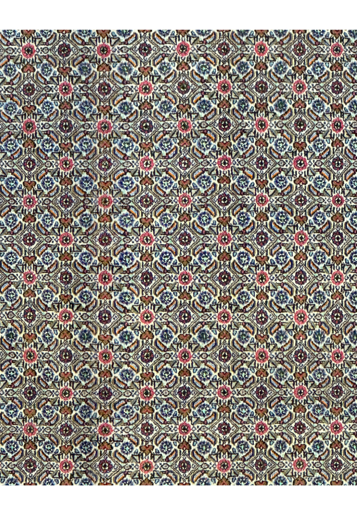 Zoomed-in view of the rug's pattern, highlighting the precision of the floral motifs and the subtle color variations.