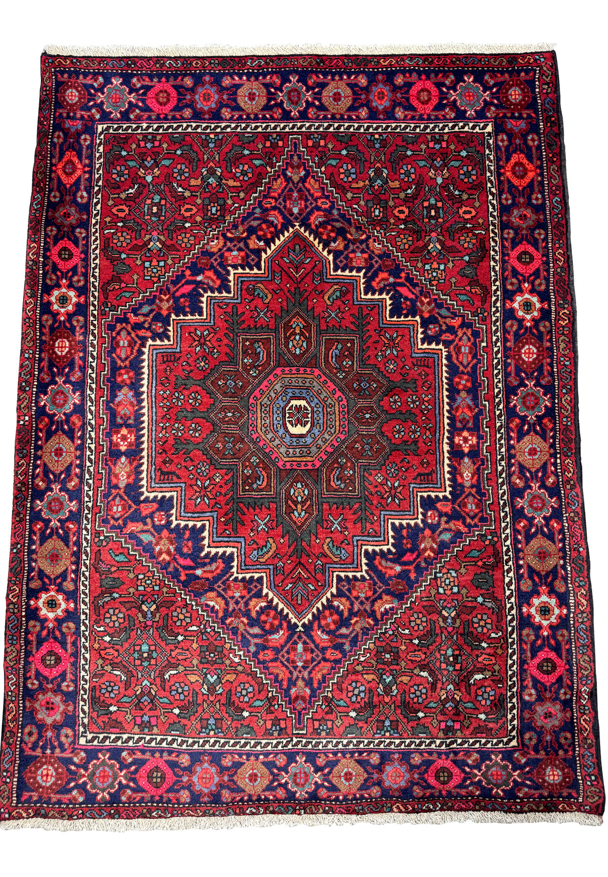 Overhead perspective of a 3'4" x 4'8" Persian Gholtogh rug, highlighting the complex interplay of colors and traditional Persian motifs