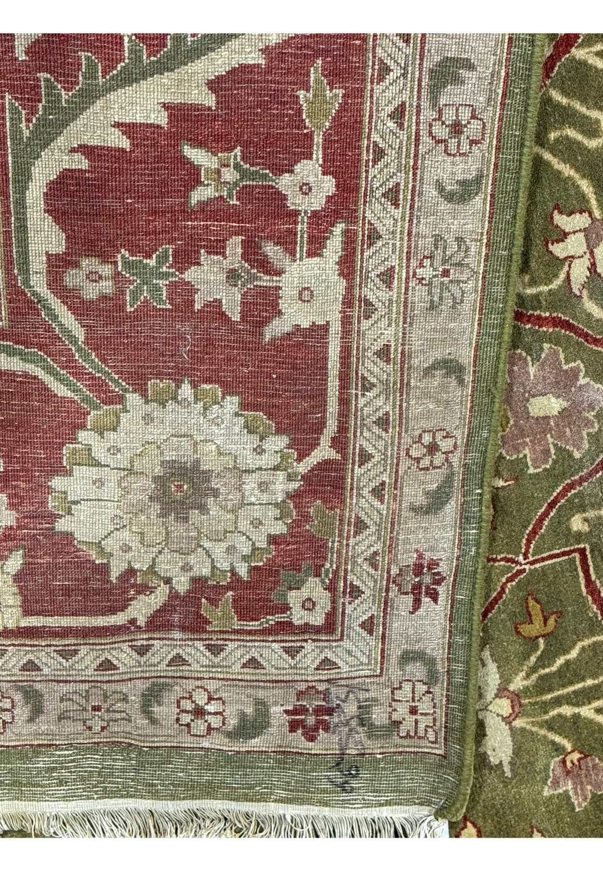Backside view of a 10x15 Chobi Peshawar rug illustrating the knot density and craftsmanship quality