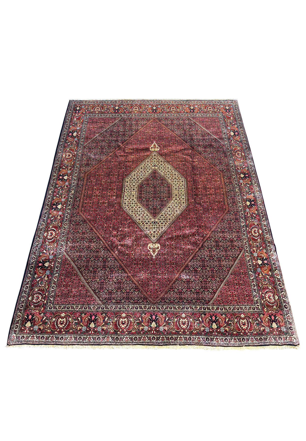 Full view of the Persian Bijar rug laid out, displaying the complex patterns and the rich, warm color scheme