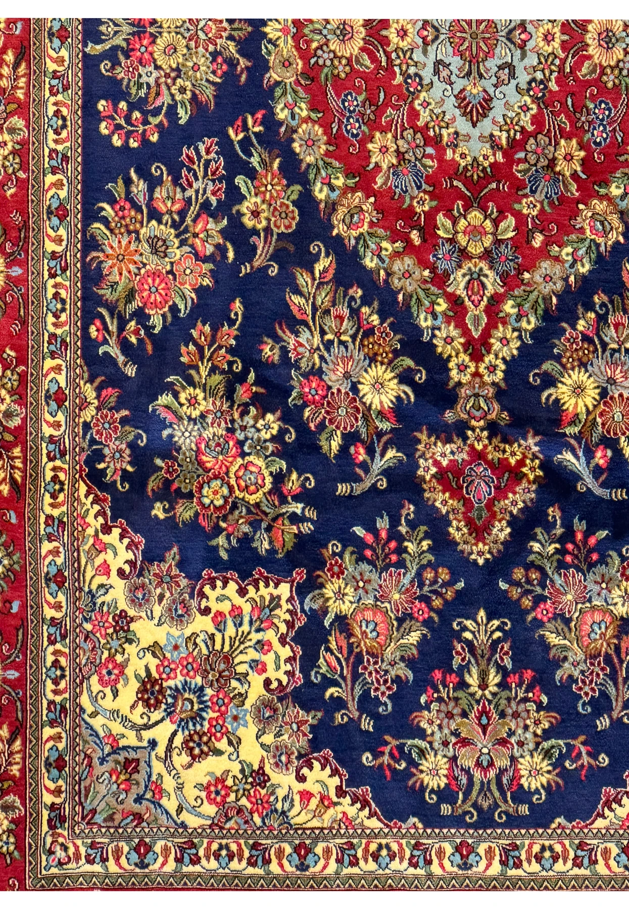 Artistic angled shot emphasizing the thick pile and luxurious texture of the Persian Qum Kork rug, with a focus on the color contrast and pattern clarity