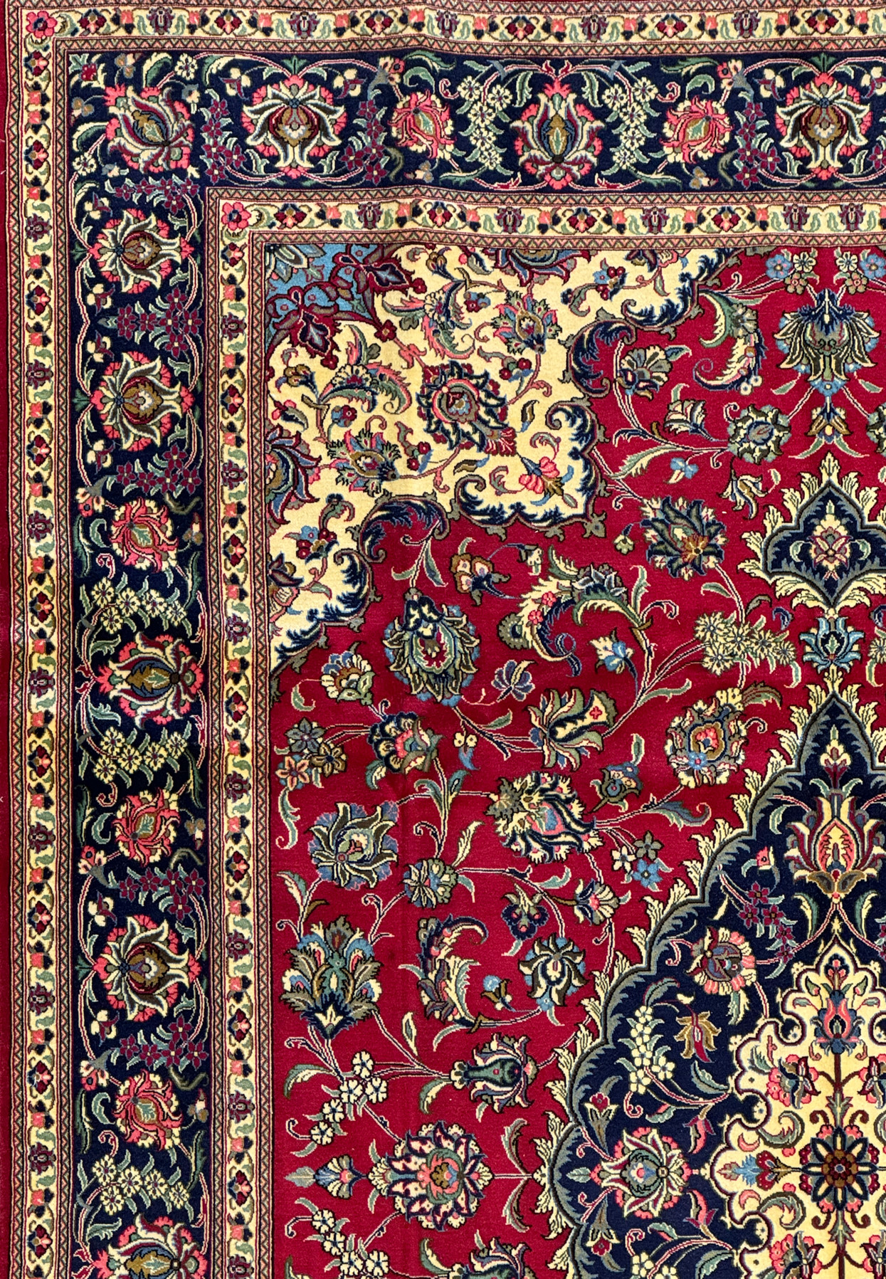 Detailed view of the intricate floral border of the Persian Qum Kork Rug, highlighting the use of multiple colors and fine detailing.