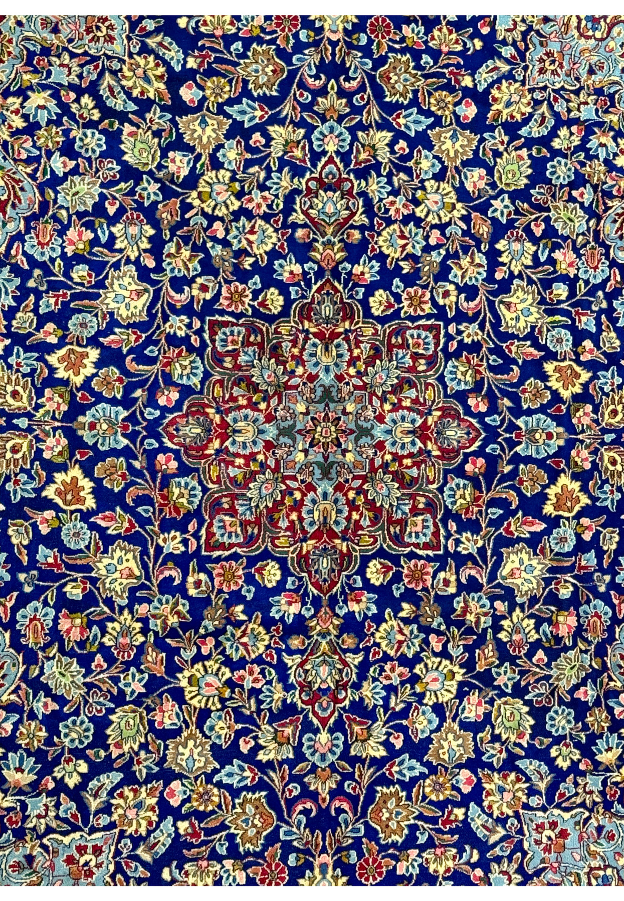 Close-up of the central medallion on a Persian Kerman Rug, displaying the intricate details and vibrant colors that make this rug a rare collector's item.