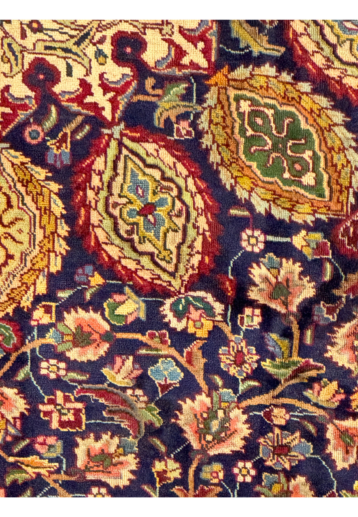 An image showing the back of the Persian Tabriz Rug, with a portion of the front visible for comparison. The intricate knotting and high-quality wool are evident, showcasing the rug's construction and durability. The detailed patterns and vibrant colors of the front are mirrored in the tightly woven knots on the back, highlighting the precision of the craftsmanship.