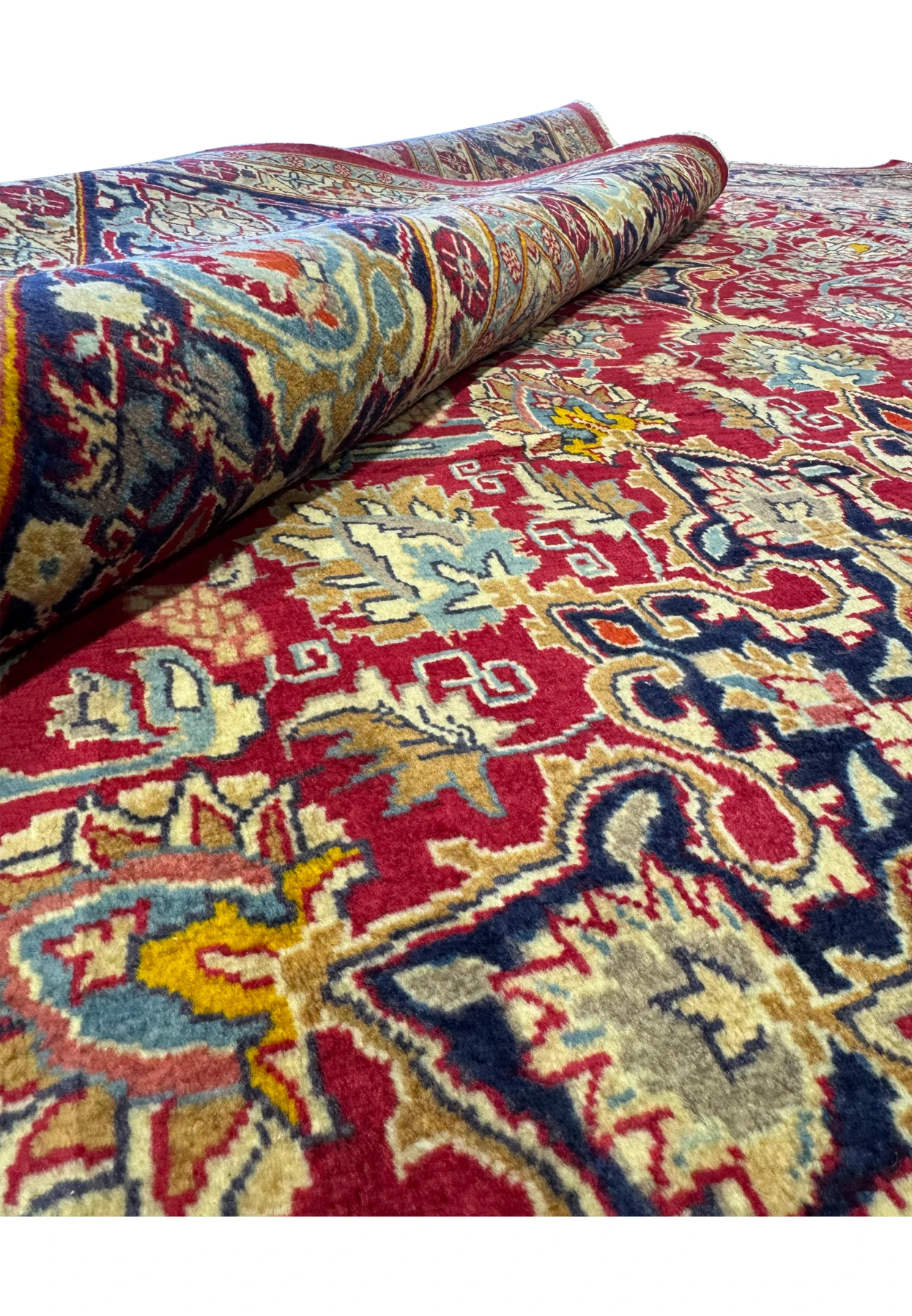 Vivid display of the Persian Mahal rug's central medallion, encircled by intricate designs, perfect for enhancing the luxurious feel of any interior