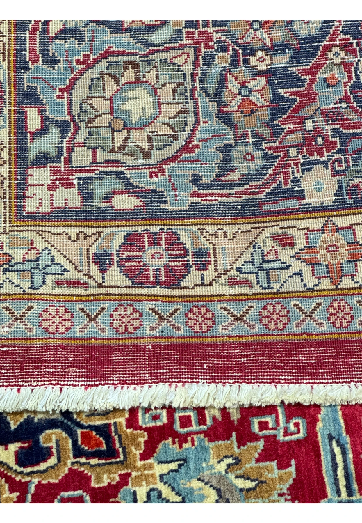 This corner shot of the Persian Mahal rug shows off its meticulous weave and color scheme, ideal for adding warmth and style to your space