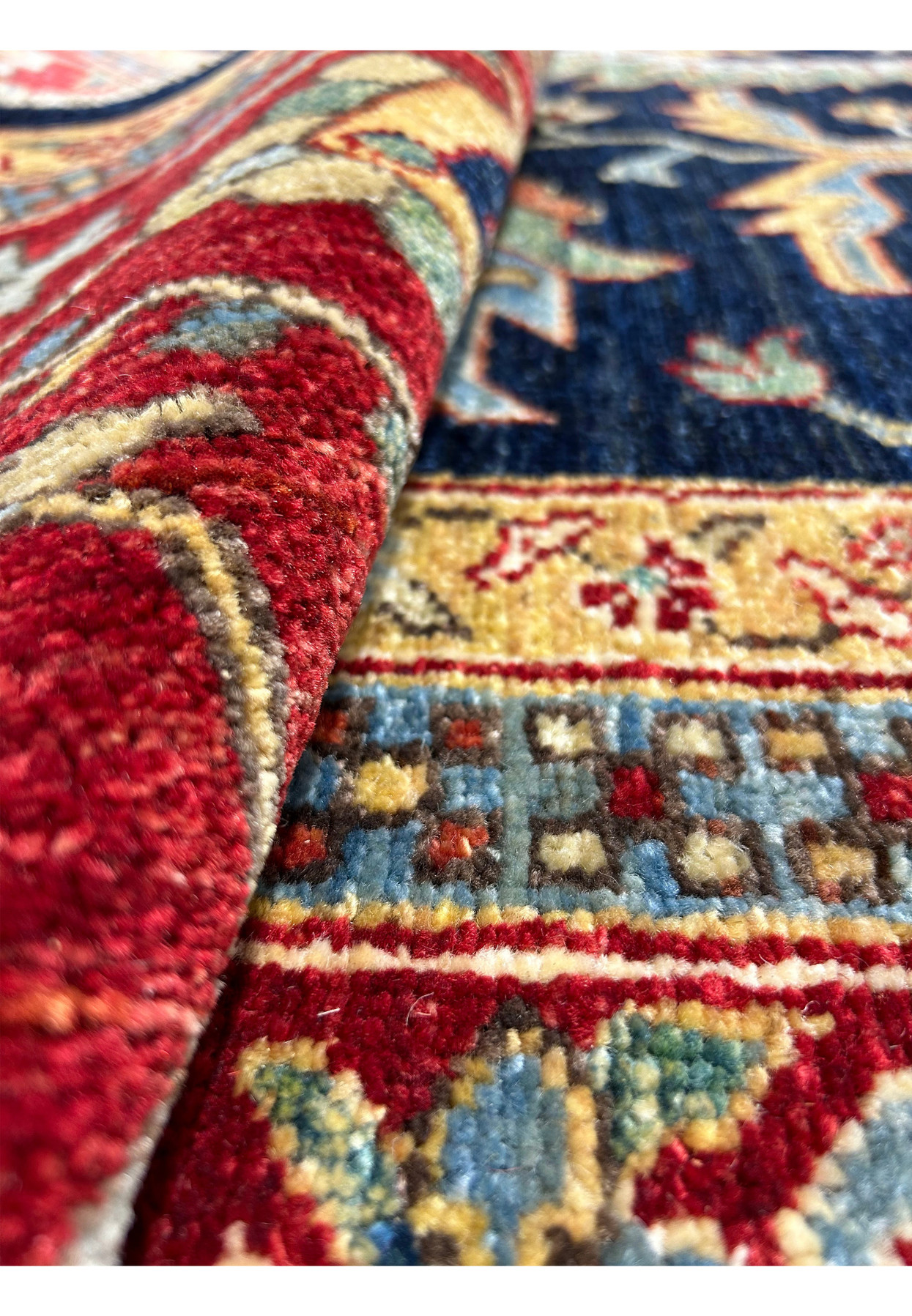 Full view of a 10x16'4 handmade Ziegler rug, displaying the overall design and rich color  palette