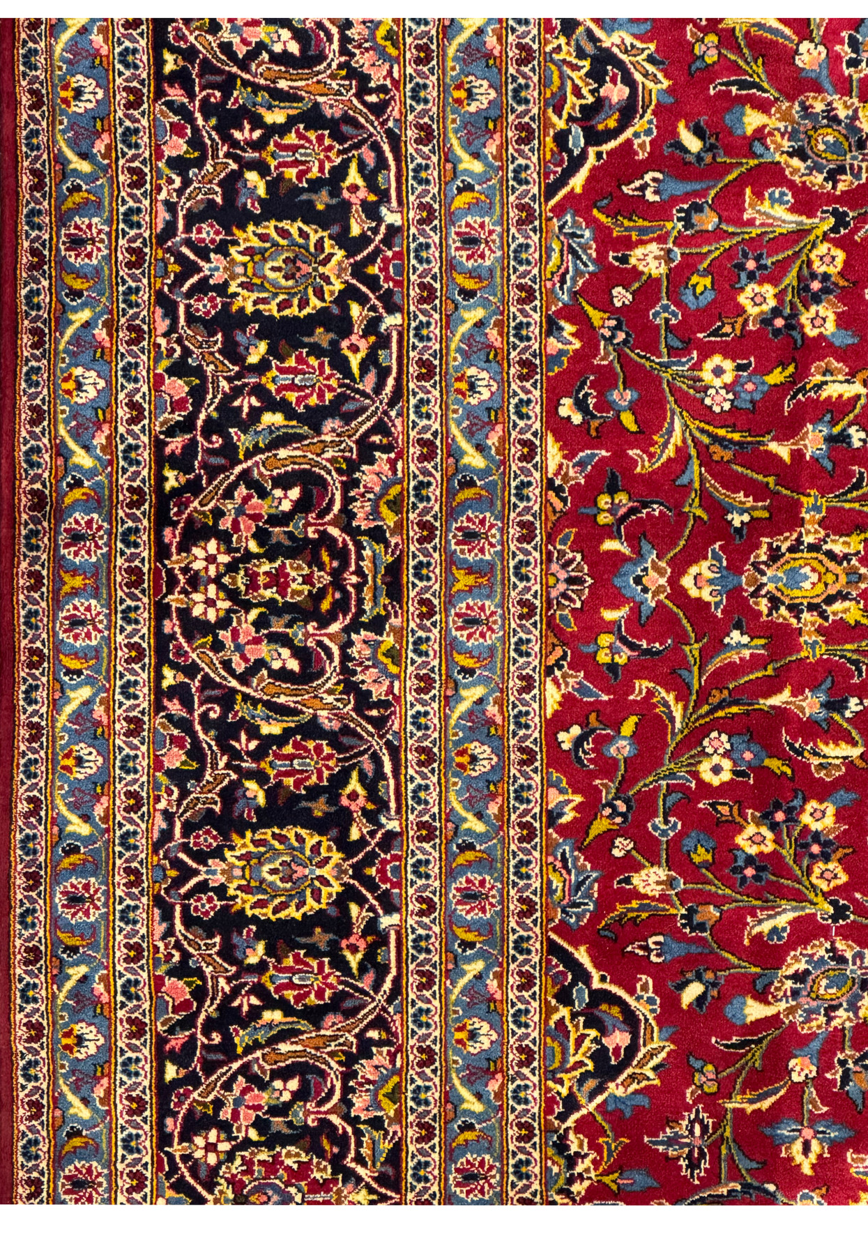 Detailed view of the border patterns on a Persian Kashan Rug, featuring floral and geometric designs.