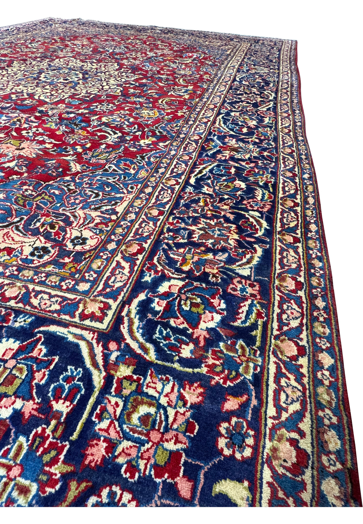 Side view showcasing the plush wool pile of the 9'11 x 12'11 Persian Isfahan Rug.