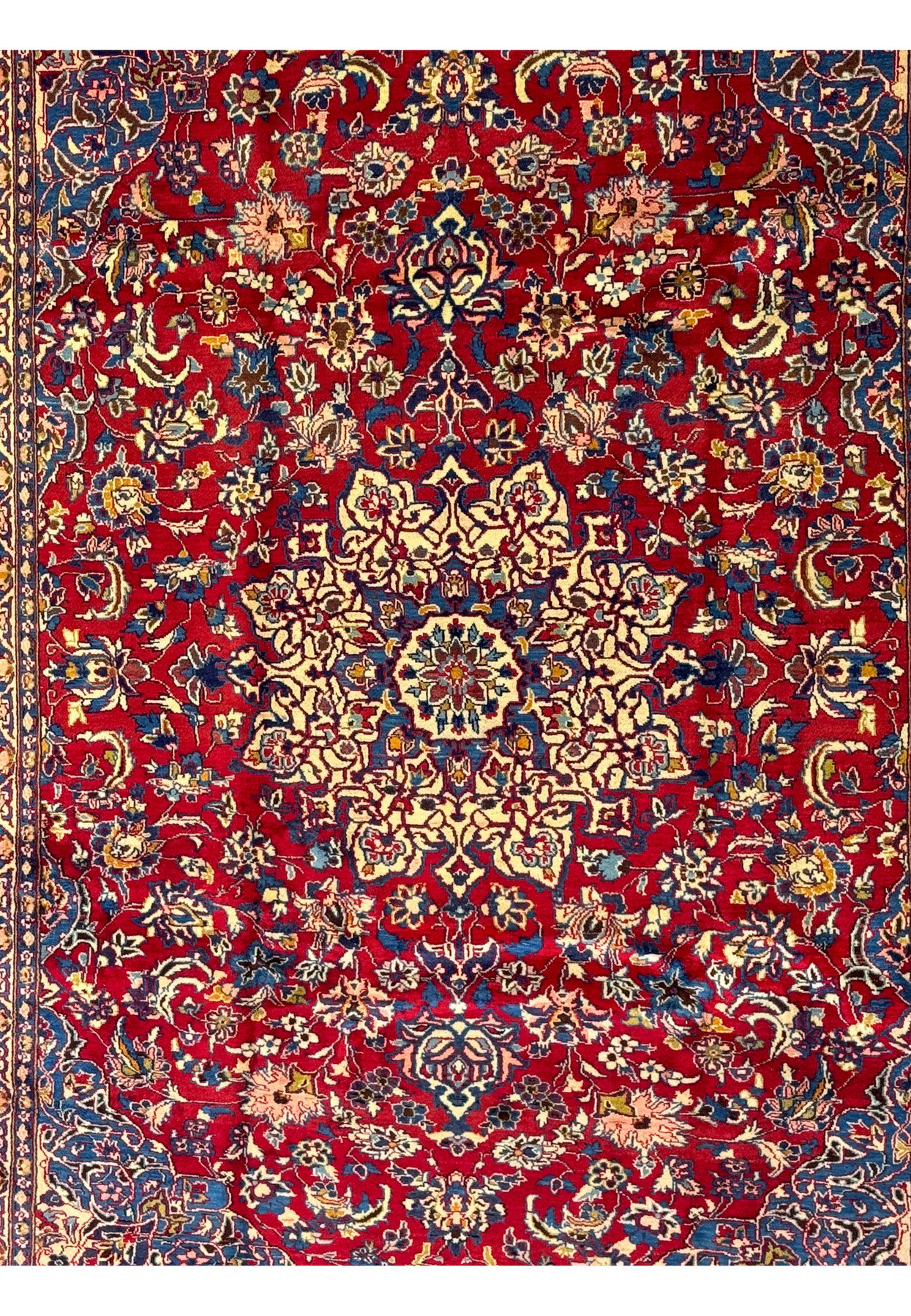 Detailed view of the central medallion and floral motifs on the 9'11 x 12'11 Persian Isfahan Rug.