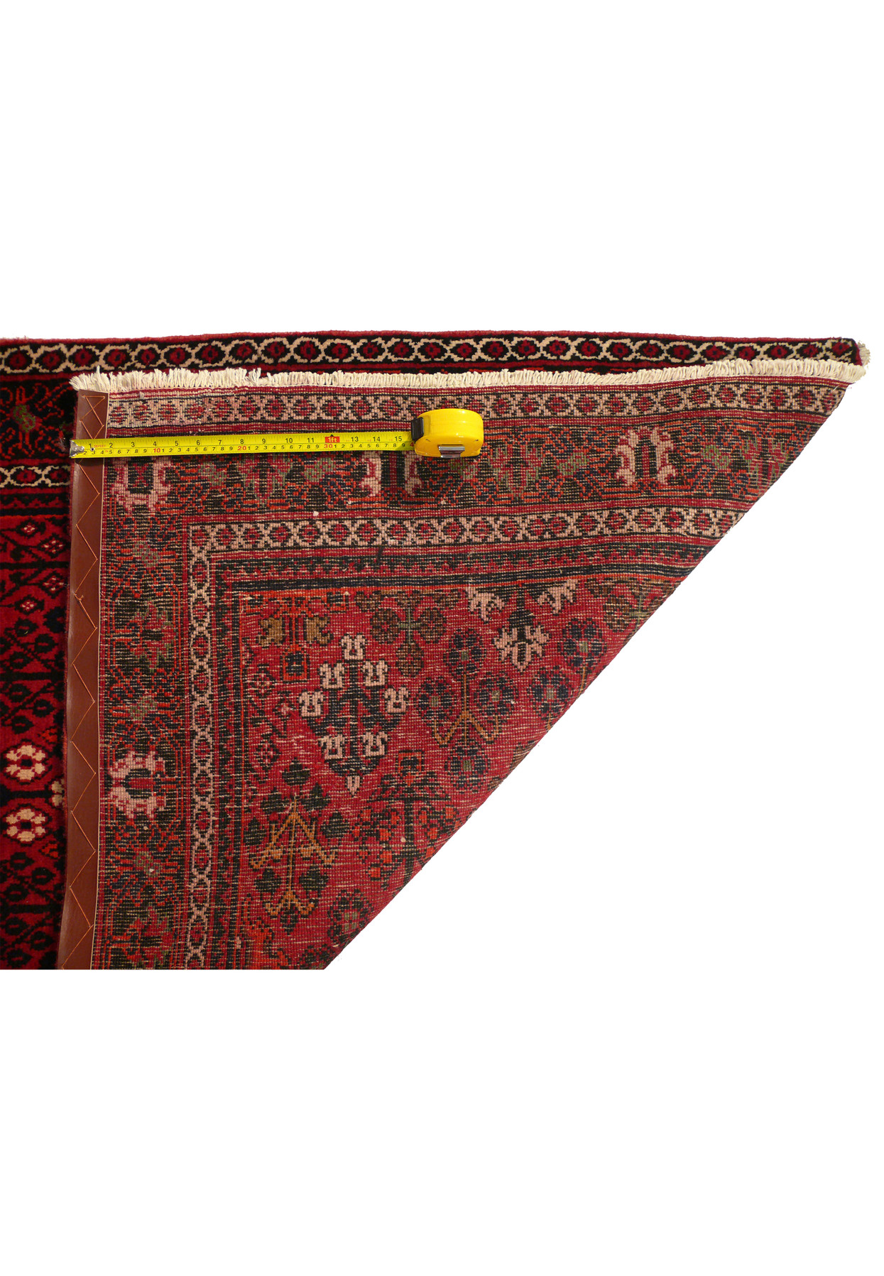 Detailed look at the underside of the Persian Meymeh runner rug, highlighting the dense weave and high-quality construction. The natural wool fibers and tight weaving technique contribute to the rug's durability and longevity.