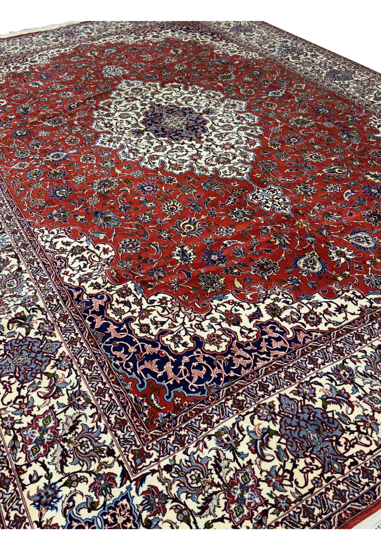 angled view showcasing the full intricate design of the Persian Isfahan Silk Rug.