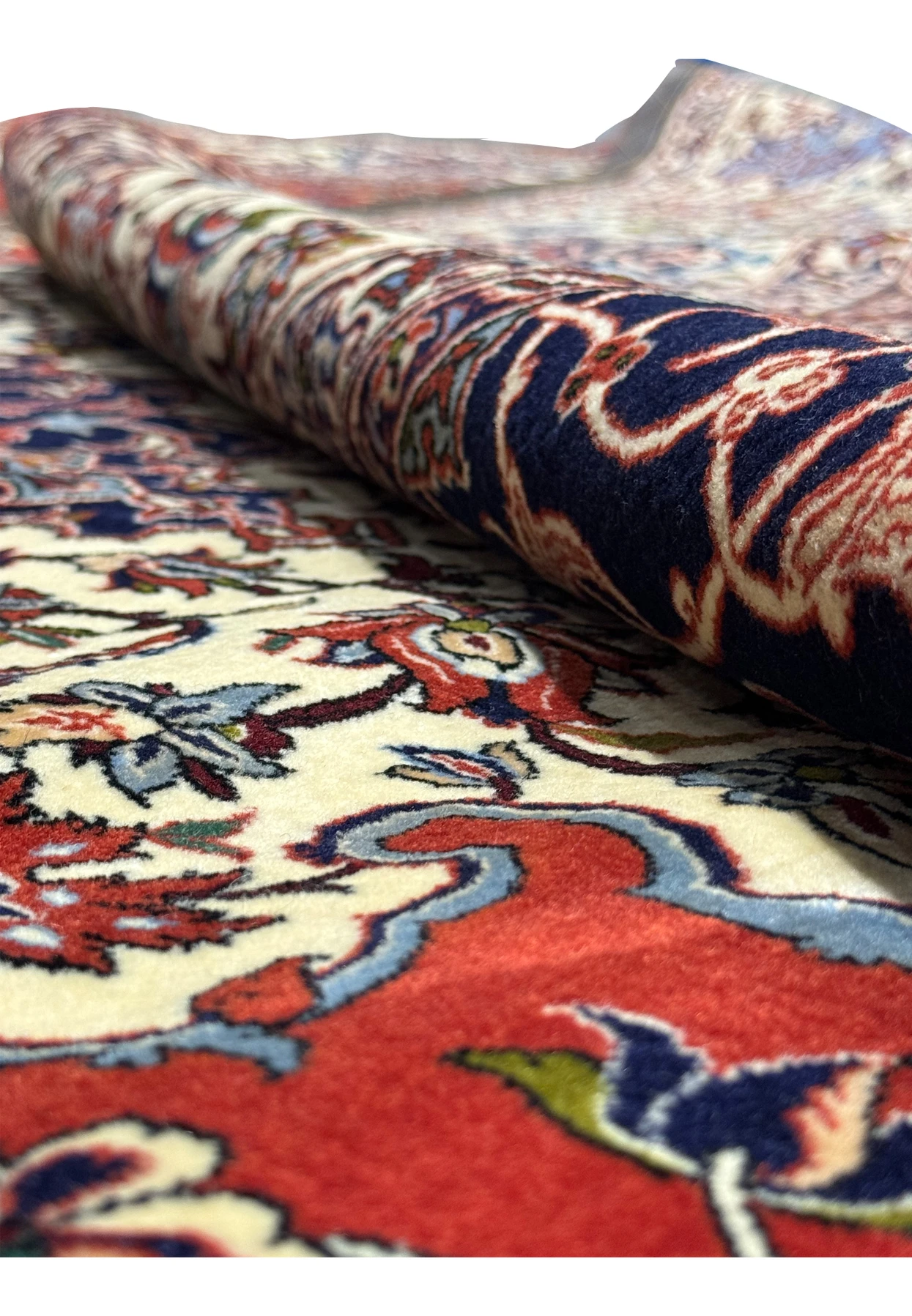 Rolled view highlighting the detailed floral patterns in Persian Isfahan Silk Rug.