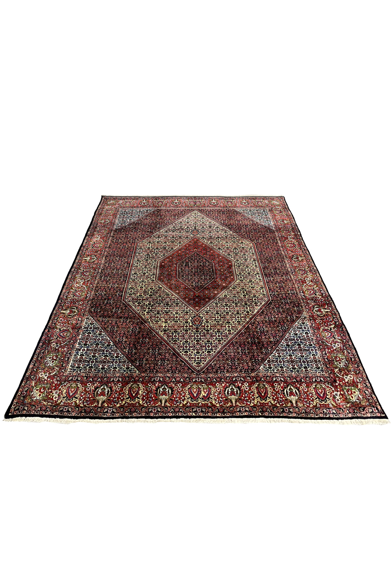 10x12 Persian Bijar rug laid flat showing bold central medallion, intricate repeating motifs, rich red and navy tones, ivory background, and heavy wool construction.