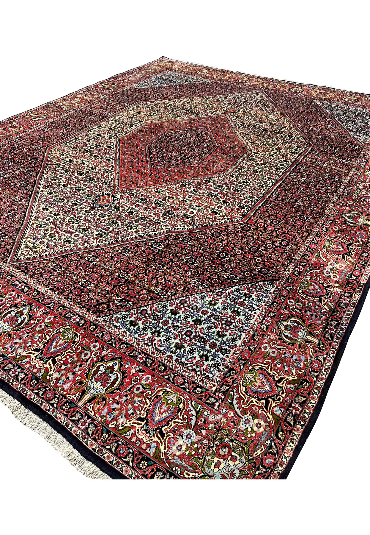 Angled view of a Persian Bijar rug highlighting its thick wool pile, crisp geometric patterning, layered medallion layout, and durable hand-knotted structure.