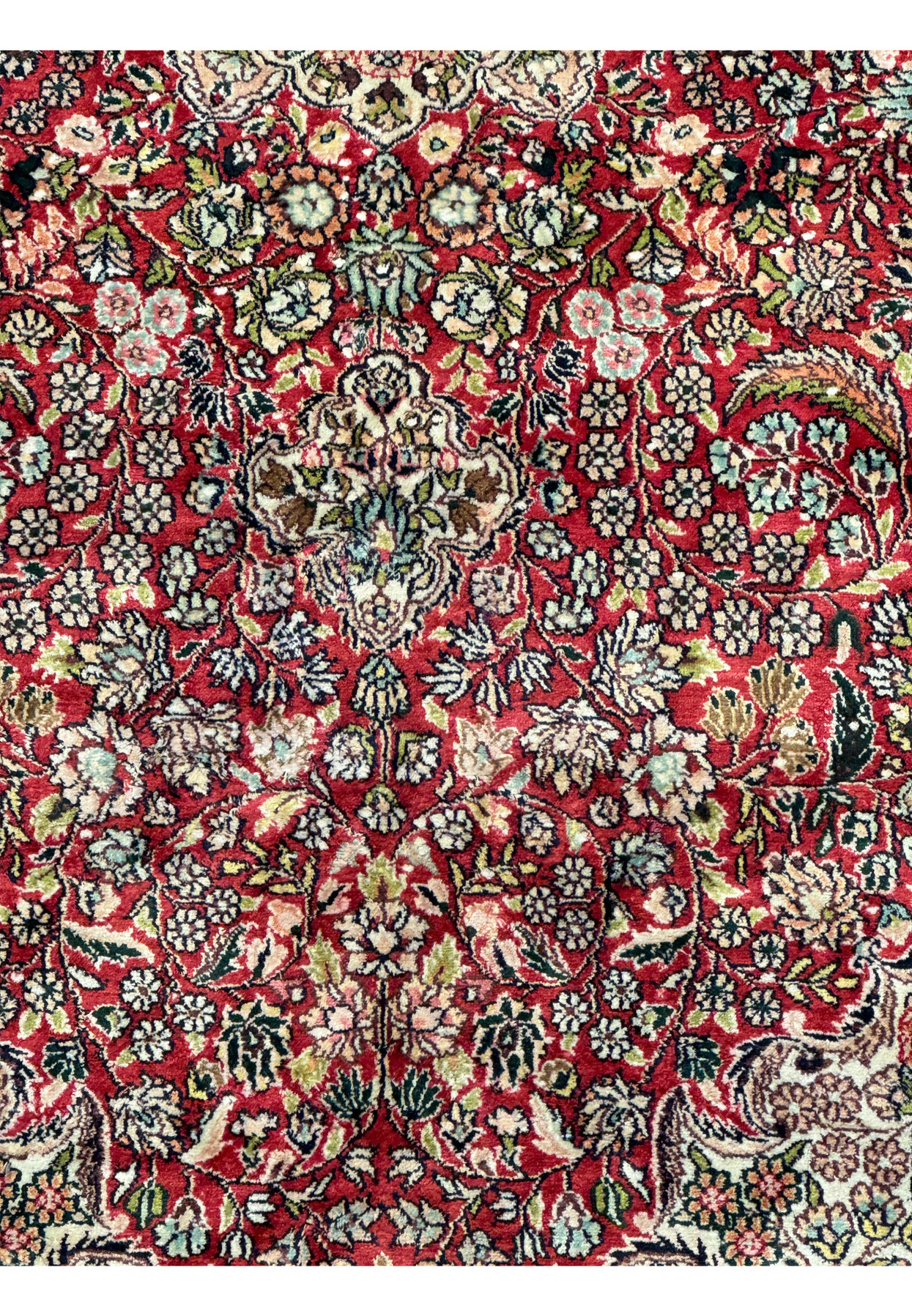 Close-up of the intricate floral patterns in the border of the 5 x 8 Oriental Kashmir Silk Rug, highlighting the craftsmanship and attention to detail.