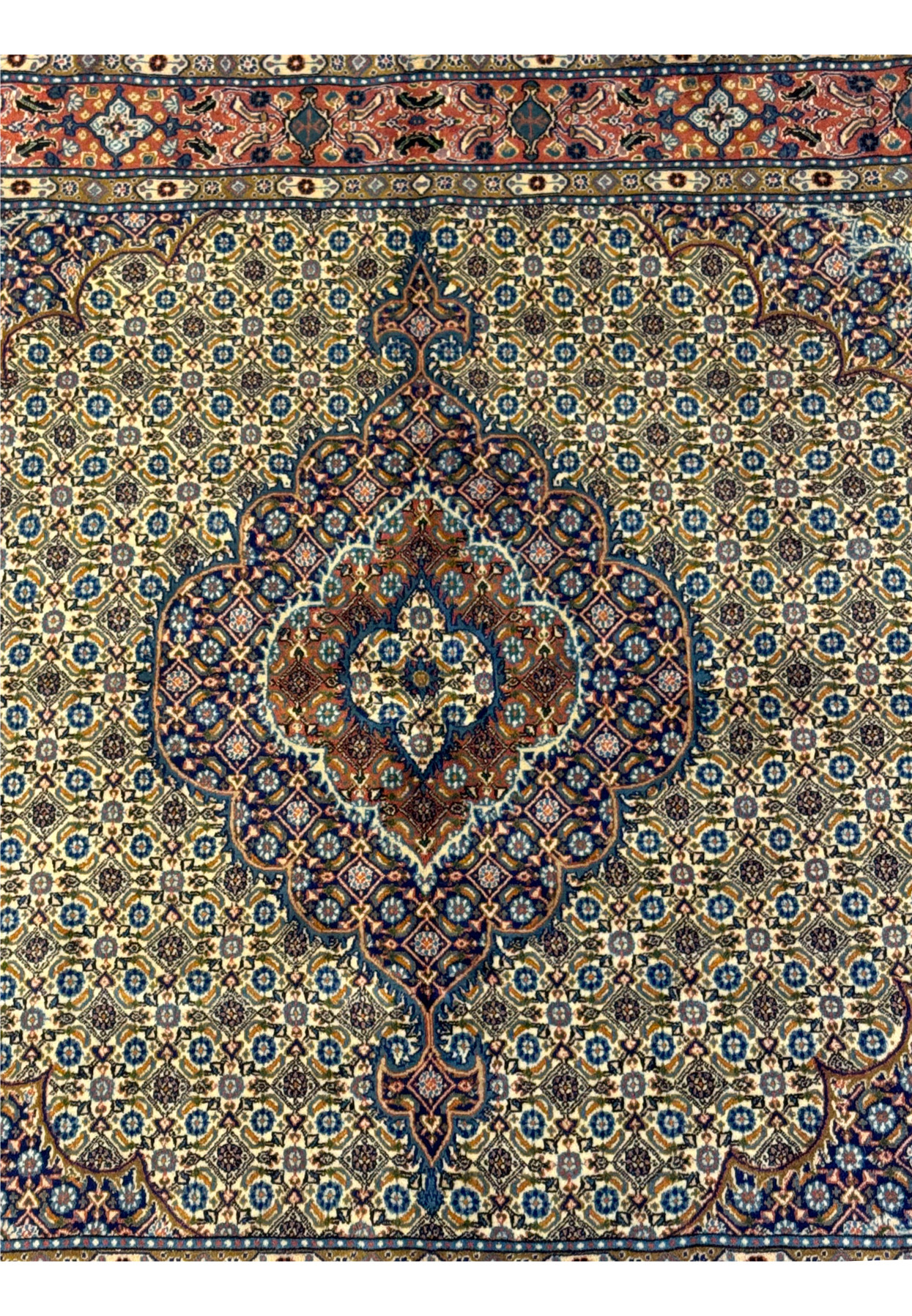 Close-up of the central medallion on the Persian Moud Square Rug, featuring detailed floral motifs and rich color palette