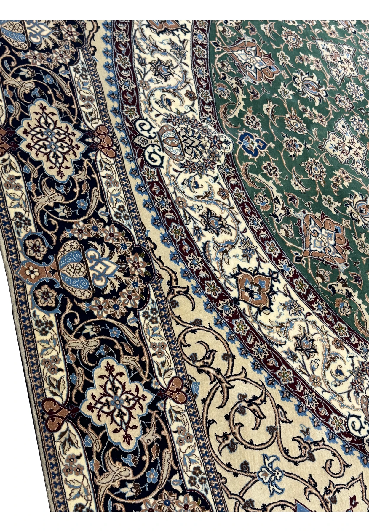 Corner perspective highlighting the exquisite border and floral motifs.