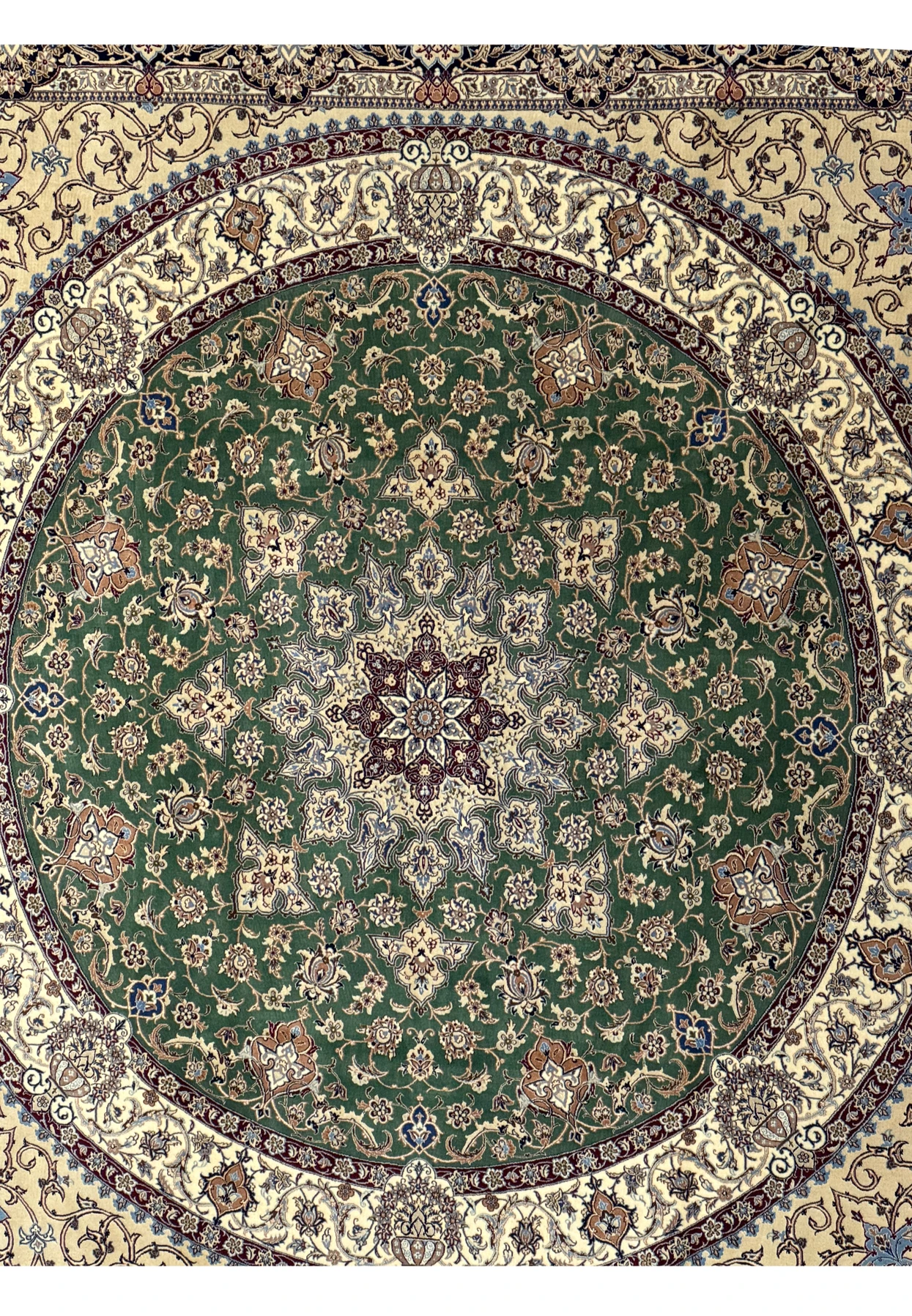 Detailed view of the central medallion on a 9 x 9 Nain 6LA Persian Rug