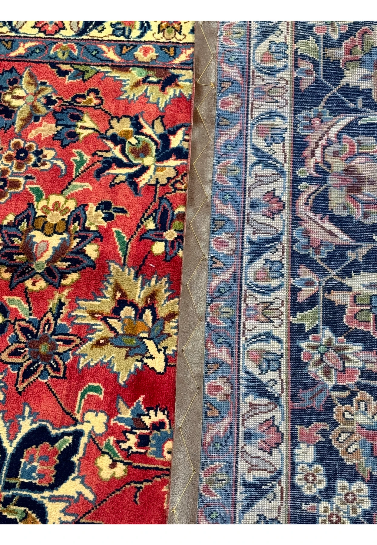 10'2 x 13'7 Persian Isfahan folder to show the backside of this high quality rug