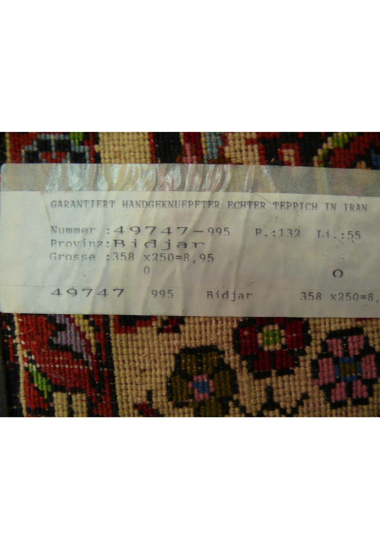 Tag on 8'2" x 11'8" Persian Bijar Rug with size and origin details