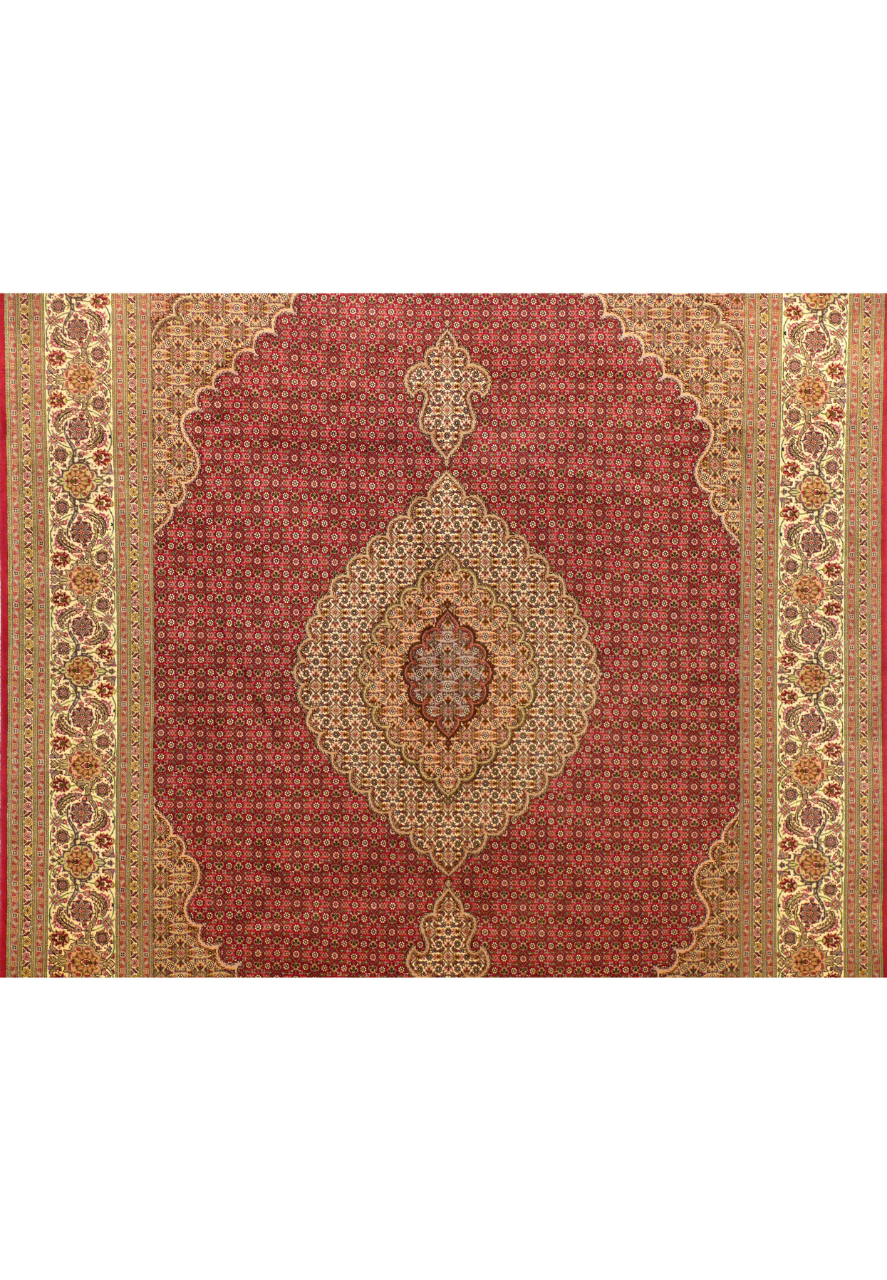 Close-up of the medallion of the 6'8 x 10 Persian Tabriz Mahi Rug, showcasing the intricate floral and geometric patterns.