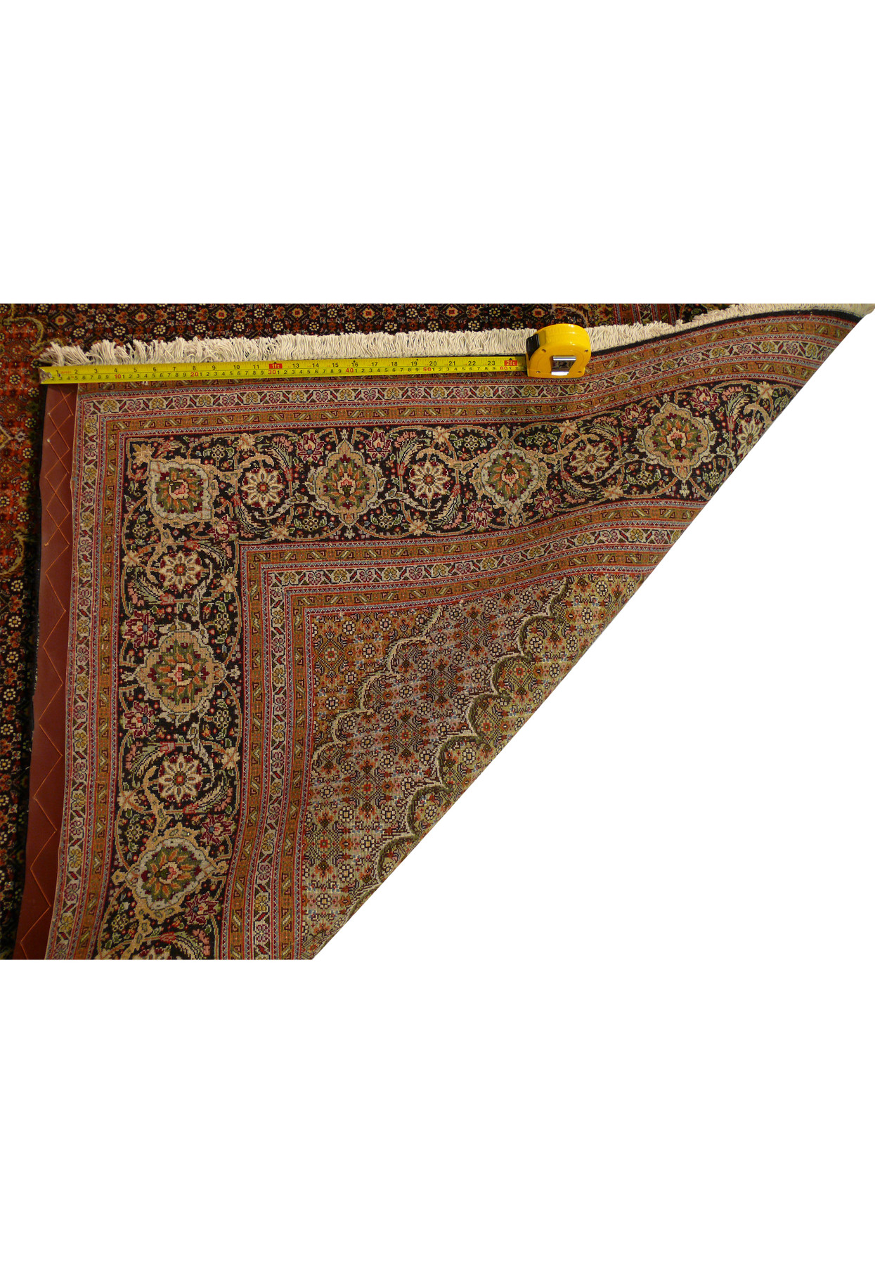 Backside of 6'8" x 9'7" Persian Tabriz Mahi 50 Raj Rug showing fine knotting and craftsmanship.