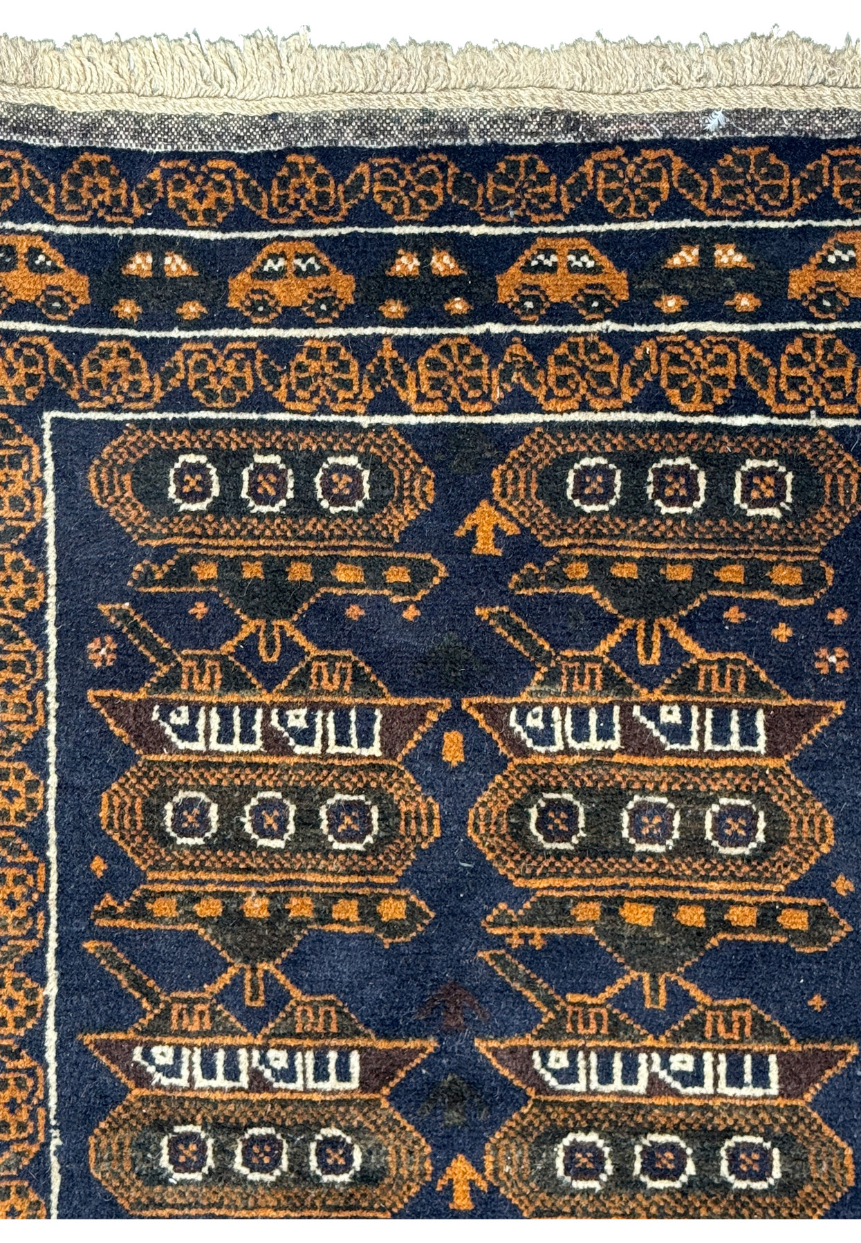 Upper part of the 2'9 x 4'4 Persian Baluch Rug displaying the detailed border and tank designs.