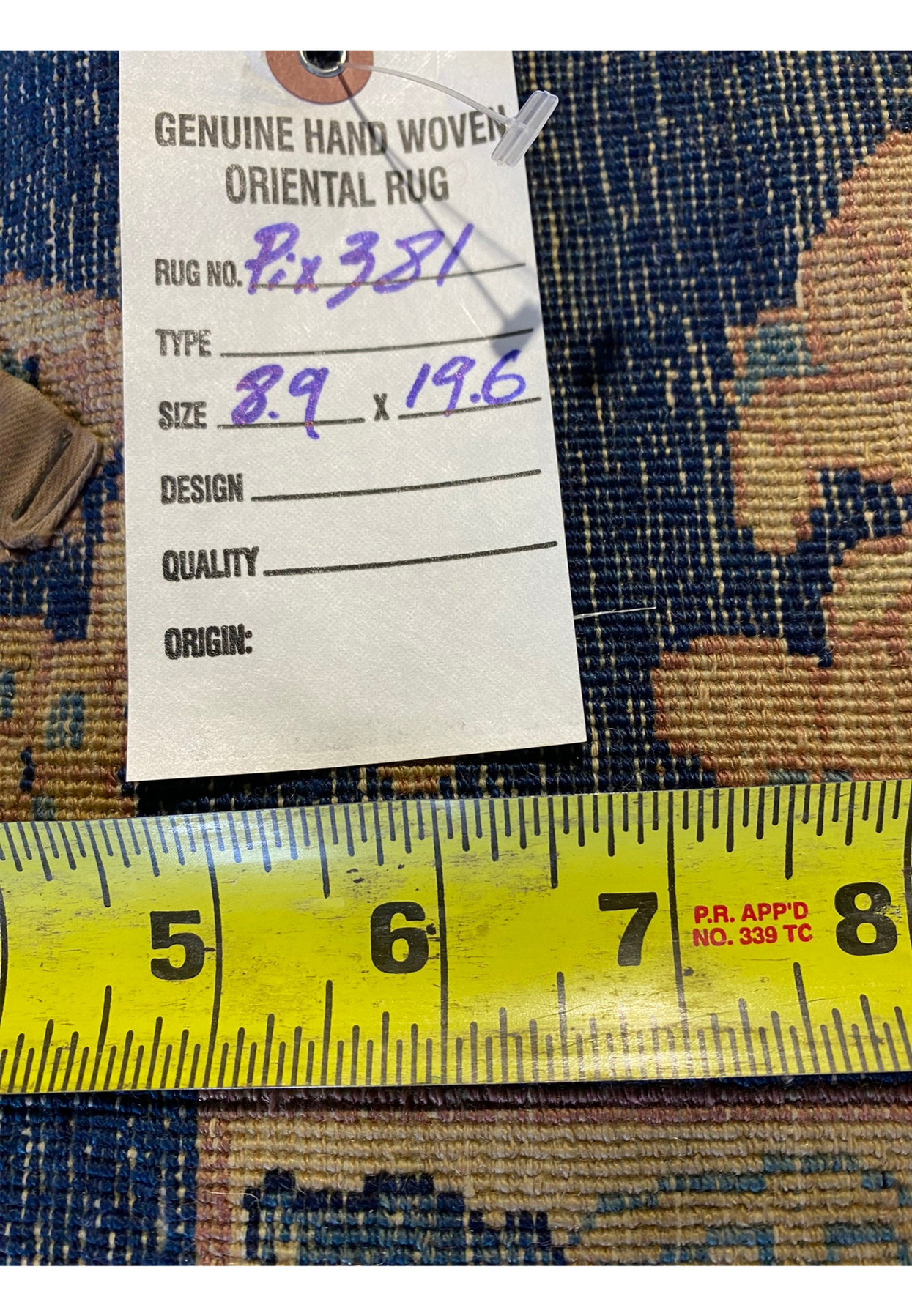 Backside of the 8'9 x 19'6 Persian Kerman Lavar rug showcasing craftsmanship details